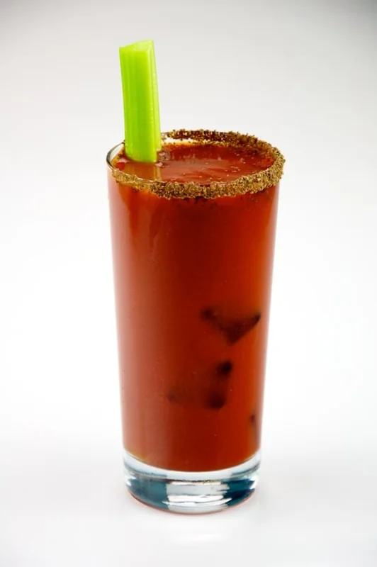 A Bloody Mary cocktail with celery stalk garnish