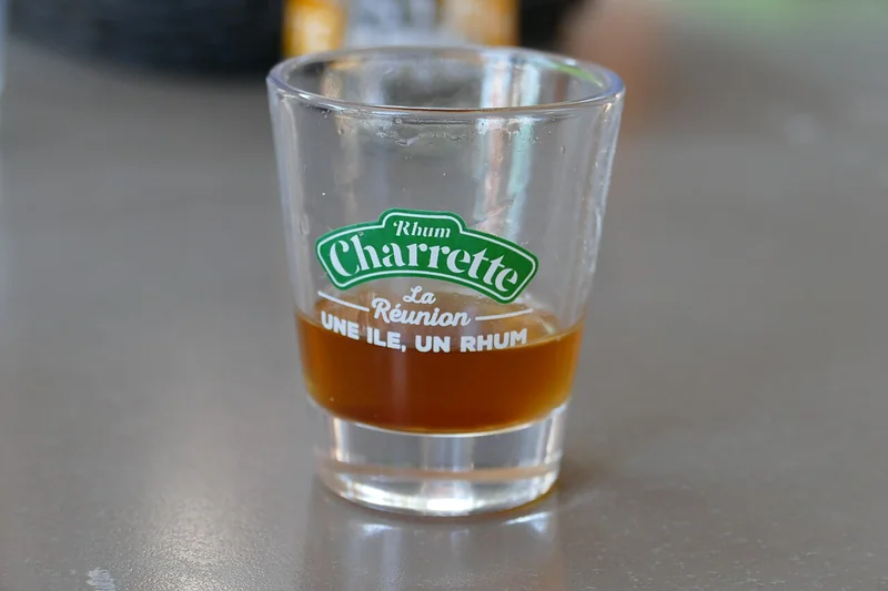 A glass of rum from Réunion, rum being a sugarcane-based cocktail base spirit