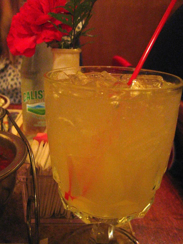 A Tommy's Margarita of tequila, fresh lime and agave syrup served on the rocks
