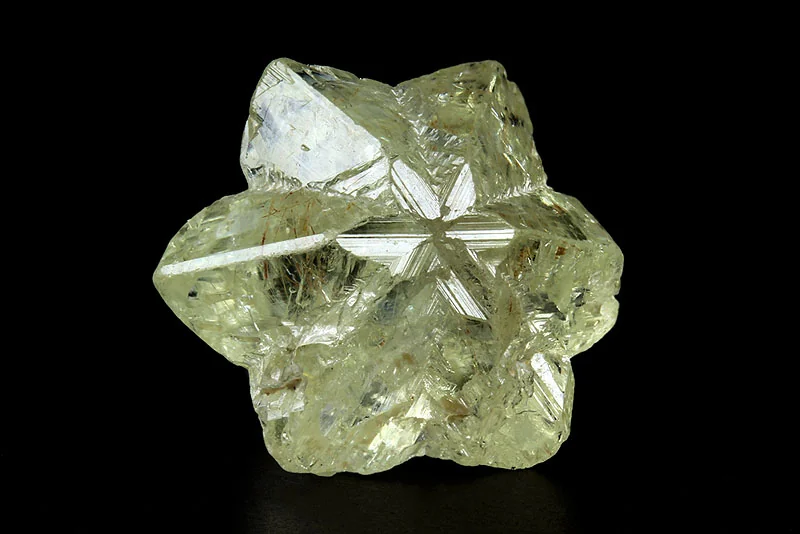 Chrysoberyl crystal cluster showing orthorhombic crystal habit and yellow-green colour