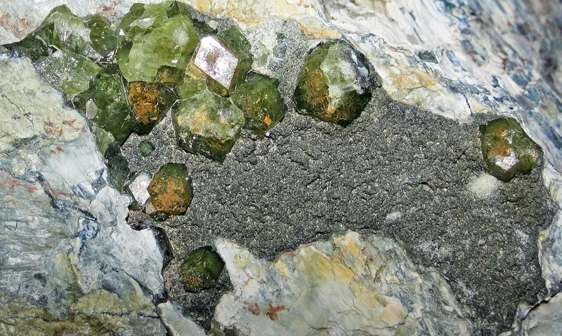 Garnet specimen; demantoid is the green andradite variety with exceptional dispersion