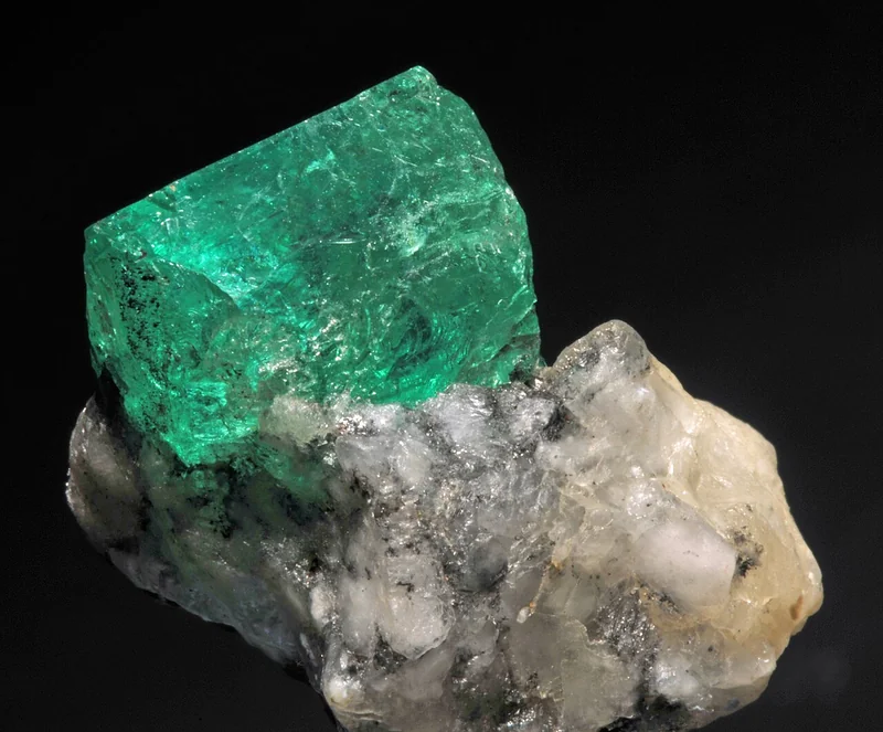 Natural emerald crystal specimen in matrix showing characteristic green colour