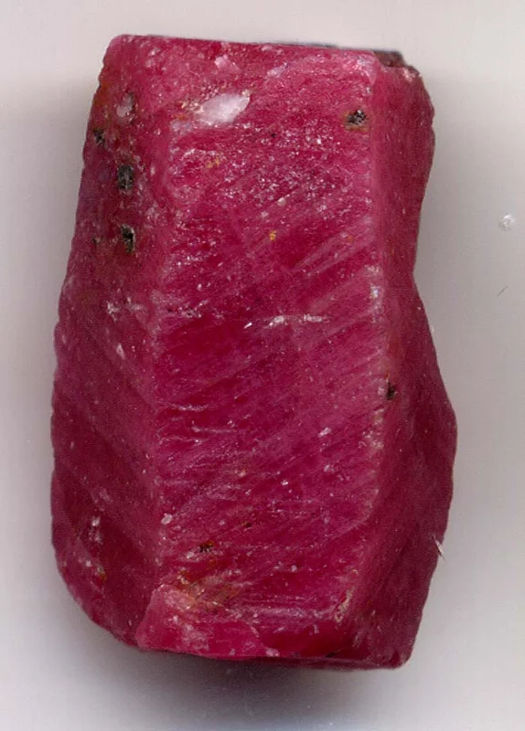Ruby crystal showing characteristic vivid red corundum representing July's birthstone
