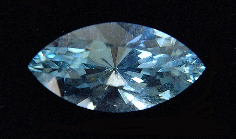 Marquise-cut diamond showing elongated navette outline with pointed ends and brilliant facet arrangement