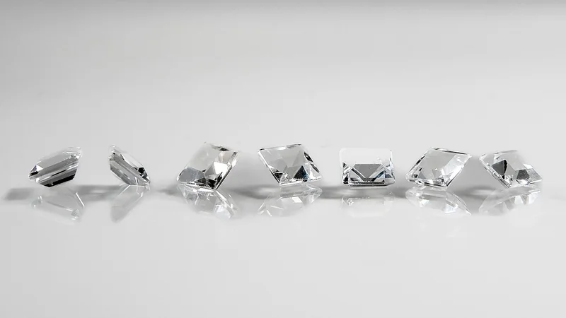 Faceted gemstone showing step-cut facet arrangement with parallel tiers