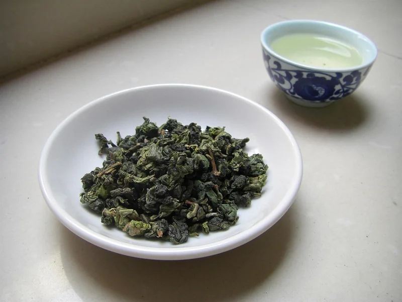 Tieguanyin oolong tea rolled balls in a gaiwan