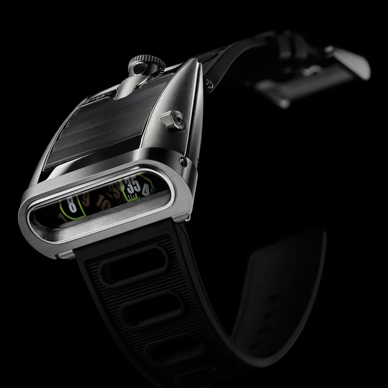 Watch dial with jumping hour aperture displaying a numeral that changes instantaneously at the hour